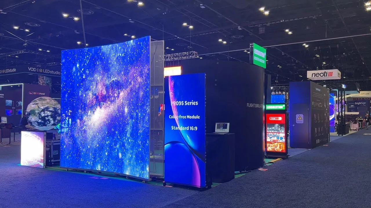 InfoComm Asia 2026 — exhibition hall panorama with LED screens and AV equipment